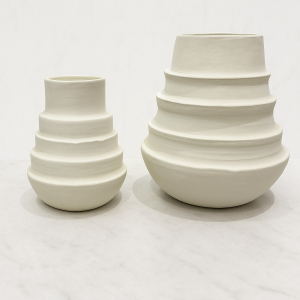 White ceramic tiered Ringlet vase modern minimalist neutral home decor on textured background