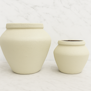 Ivory ceramic minimalist vase modern neutral home decor on marble background