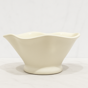 White ceramic wavy rim vase modern minimalist home decor on neutral background